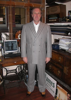 Mr Mark Ginders in his double breasted bespoke suit in scabal fabric