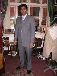 Bespoke three piece suit with waist coat